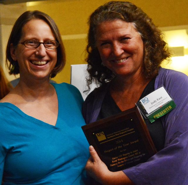 Judy East & Tora Johnson receiving 2014 NNECAPA Award